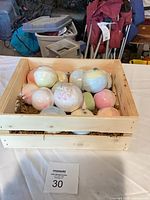 Top view of crate filled with assorted bath bombs