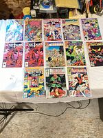 All 12 bagged Marvel comics laid out in three rows