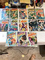 Group shot of all 12 bagged and boarded comics