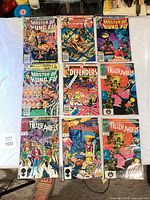 All nine comics laid out in three-by-three grid