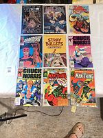 All nine comics laid out in 3×3 grid