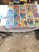 Tabletop view showing all approx. 16 ROM comics bagged and boarded