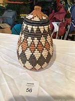 Full view of lidded woven basket