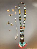 Full lot overview showing necklace, cufflinks, tie accessories