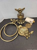 Group shot of all brass fixtures and hardware