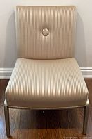 Front view of striped armless side chair