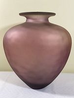 Front view of dusky purple matte glass vase