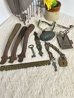 Group shot of all antique metal items on surface