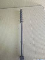 Full view of 21.5 in cast iron auger drill bit