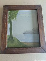 Front view of framed oil painting showing entire artwork and frame
