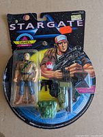 Front view of sealed Daniel Jackson action figure on card with accessories visible