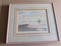 Framed print with matting and pink frame