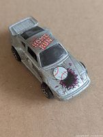 Silver Hot Wheels Porsche 930 Home Run graphics top view