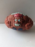 Front view showing cartoon face, arms and blue 35 decal