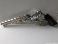 Right side profile showing full revolver decanter