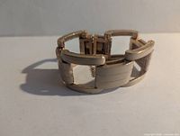Bracelet standing showing link profile and clasp