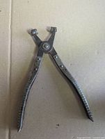 Full view of K-D Tools hose clamp pliers laying flat
