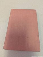 Front cover of rust cloth hardcover book