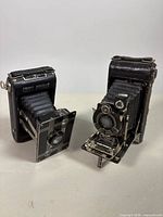 Both Kodak folding cameras side by side showing overall appearance