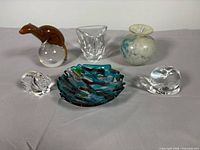 Group shot of all six art glass items
