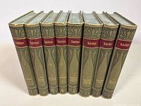 Front spines of all eight volumes showing condition and design
