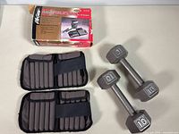 Pair of dumbbells, pair of ankle weights with inserts, and LifeGear box