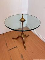 Full view of round glass top side table