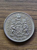 Reverse view showing Canadian Coat of Arms and denomination