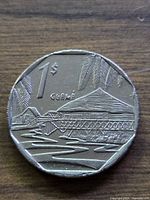 Reverse side showing 1 $ denomination and bridge scene
