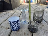 Group shot of all four items with tape measure for scale