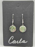 Front view of earrings on display card