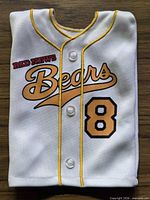 Front view showing graphics, buttons, and trim