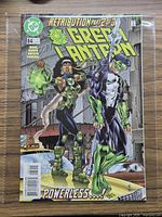 Front cover bagged comic showing issue number, title and characters