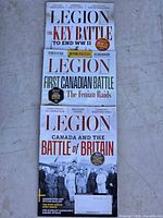 Three Legion magazines stacked, showing all front covers