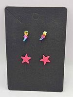 Front view showing both earring pairs on display card