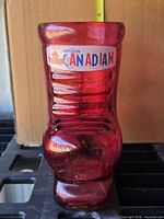 Front view showing Molson Canadian logo and boot shape