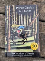 Front cover showing title, author, illustration, 50th anniversary badge