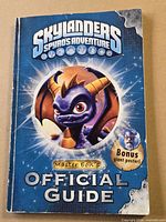 Front cover of Skylanders Spyro's Adventure Official Guide showing Spyro artwork and text