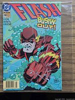 Front cover of The Flash #90 in bag with visible artwork and condition