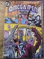 Front cover of The Omega Men #8 showing title, artwork, price