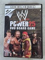 Front cover of WWE Power 25 Premium Edition DVD Board Game case