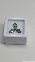Three marquise sapphires in display box