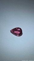Front view of pear-cut pink tourmaline