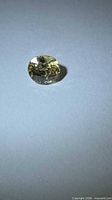 Front view of oval champagne zircon