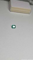 Front view of loose rectangular emerald