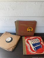 Front view showing two album books and loose sleeved records