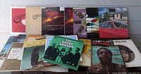 Front and back rows of 30 LPs on display