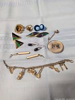 Overview of entire jewellery lot on cloth background