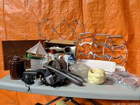 Overall view of assorted vintage kitchen and décor items on table