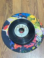 Top view showing Pablo Cruise A&M labeled record on colorful mat